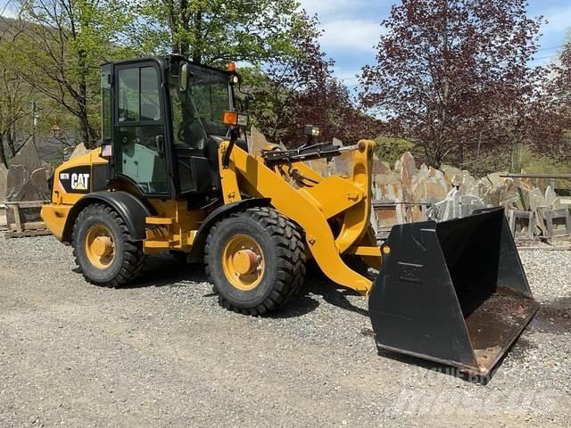 CAT 907H Kolové nakladače