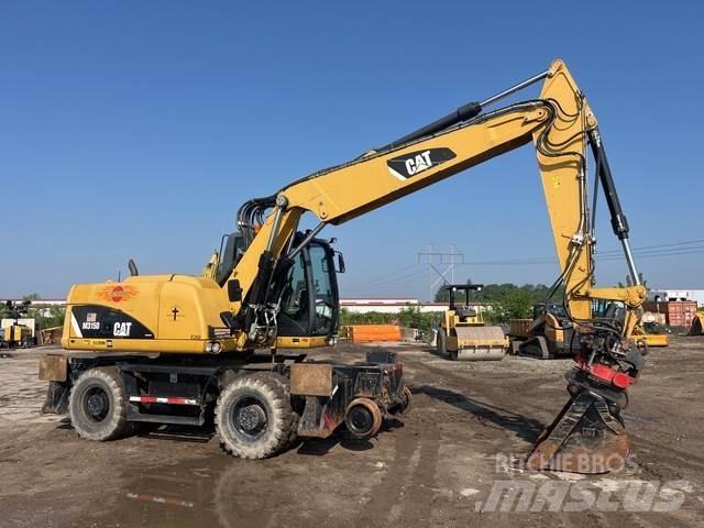CAT M315D Kolová rýpadla
