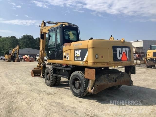CAT M318D Kolová rýpadla