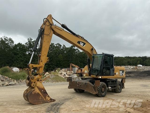 CAT M318D Kolová rýpadla