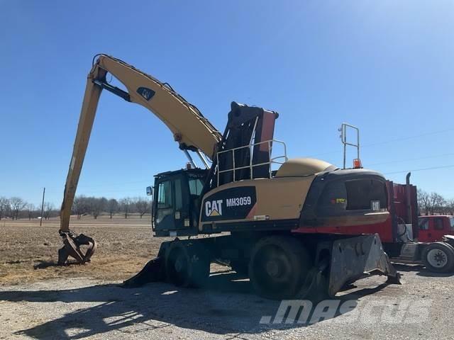 CAT MH3059 Stroje pro manipulaci s odpadem