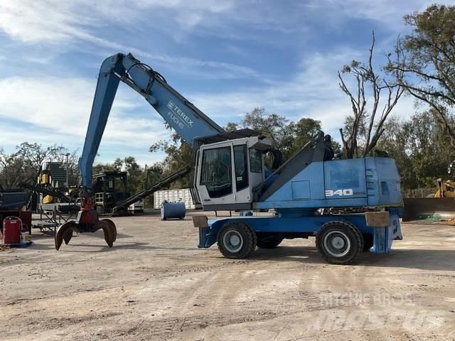 Fuchs MHL340 Stroje pro manipulaci s odpadem
