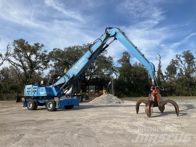 Fuchs MHL340 Stroje pro manipulaci s odpadem