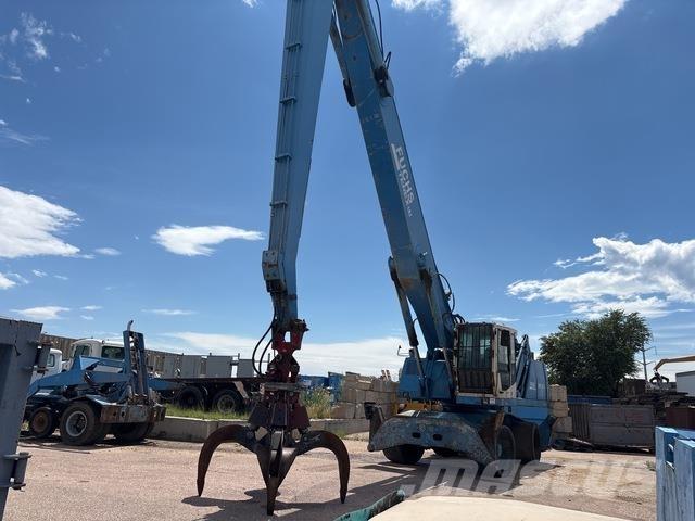 Fuchs MHL360 Stroje pro manipulaci s odpadem