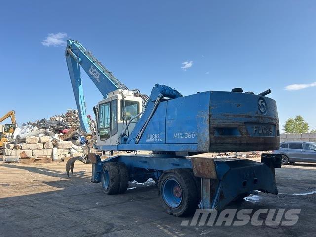 Fuchs MHL360 Stroje pro manipulaci s odpadem