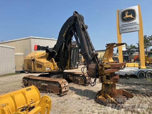 Tigercat 860C Kácecí harvestory