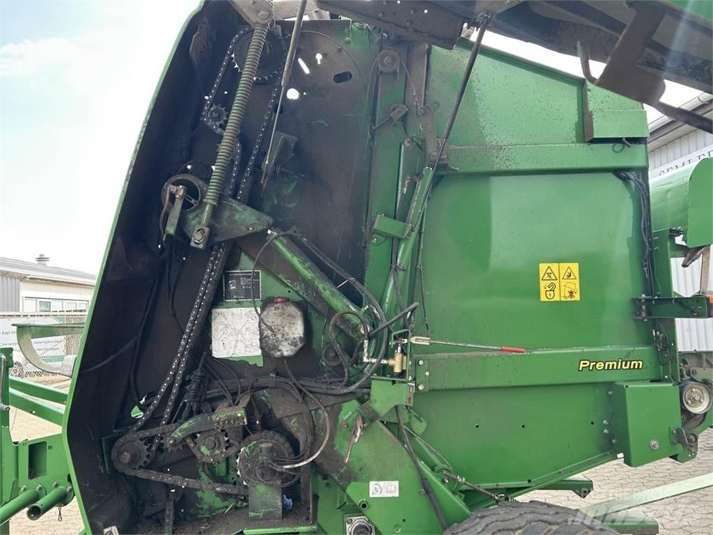 John Deere 864 Lis na válcové balíky