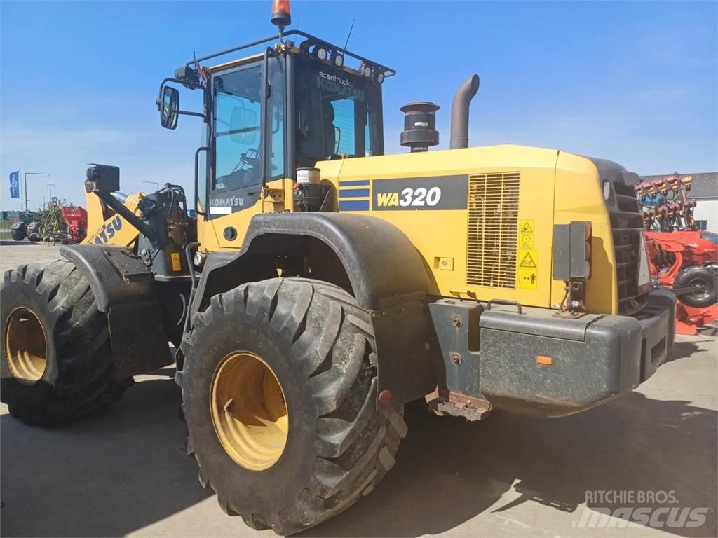 Komatsu W320 Kolové nakladače