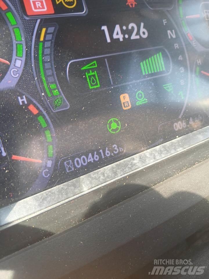 Komatsu W320 Kolové nakladače