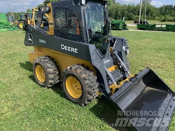 John Deere 320G Smykem řízené nakladače