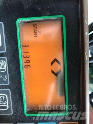 John Deere 590 Lis na válcové balíky