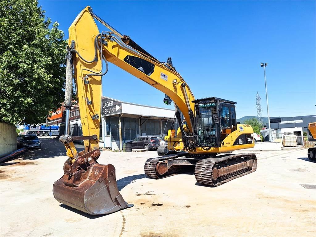 CAT 323D Pásová rýpadla