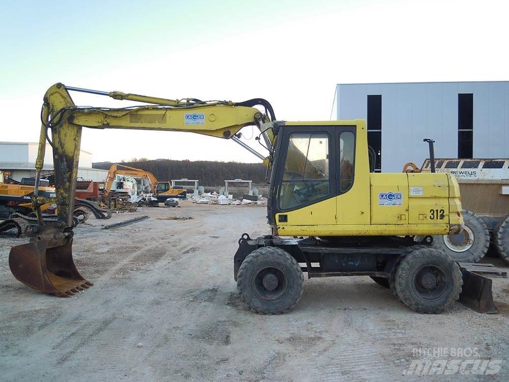 CAT M312 Kolová rýpadla