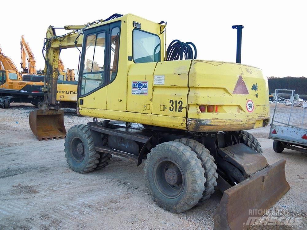CAT M312 Kolová rýpadla
