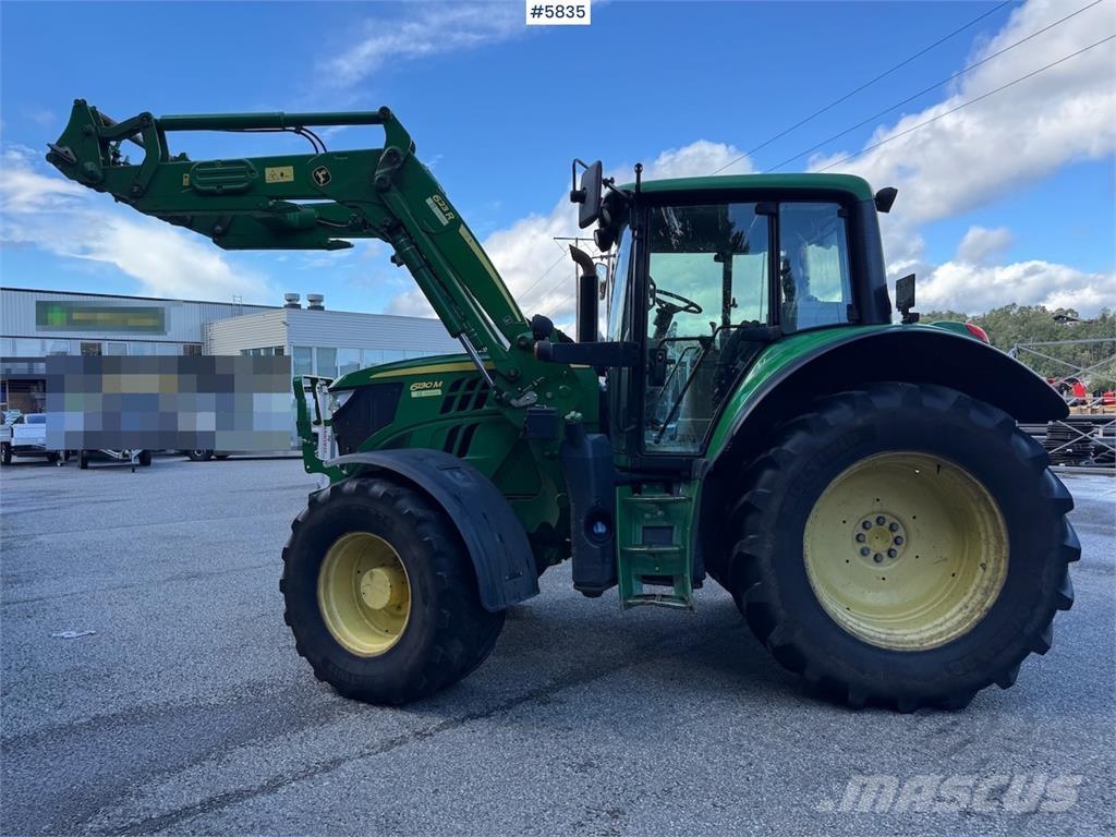 John Deere 6130M Traktory