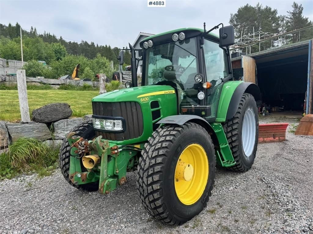 John Deere 6430 Traktory