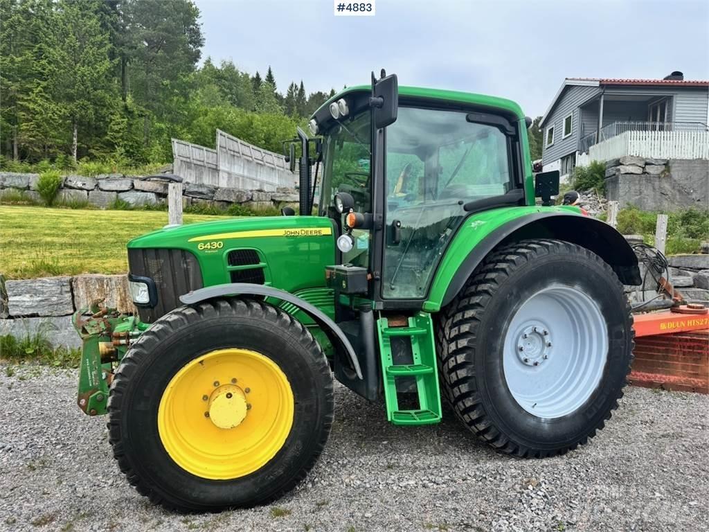 John Deere 6430 Traktory