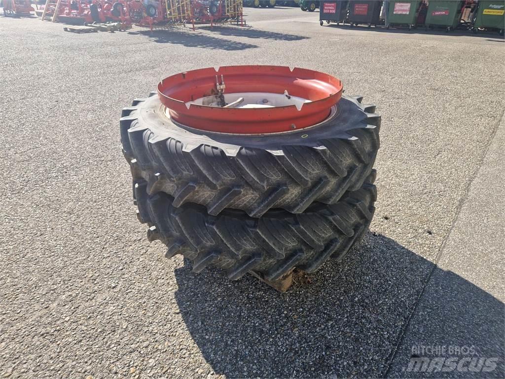 Taurus 12.4 R36 Pneumatiky, kola a ráfky
