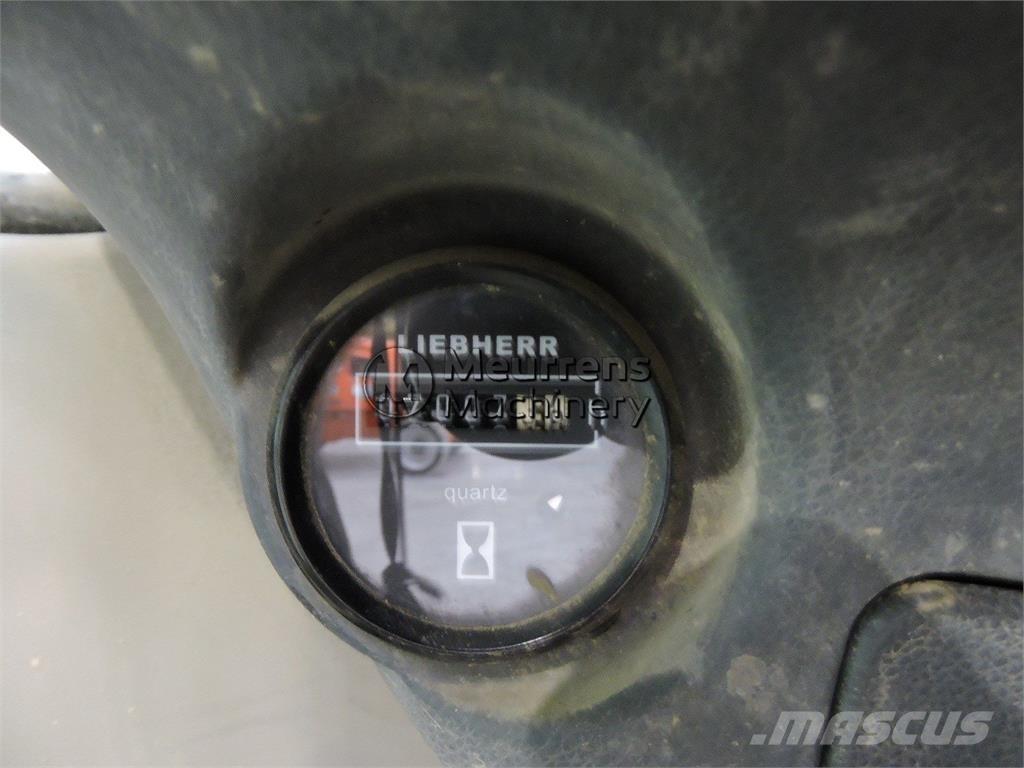Liebherr A312 Kolová rýpadla