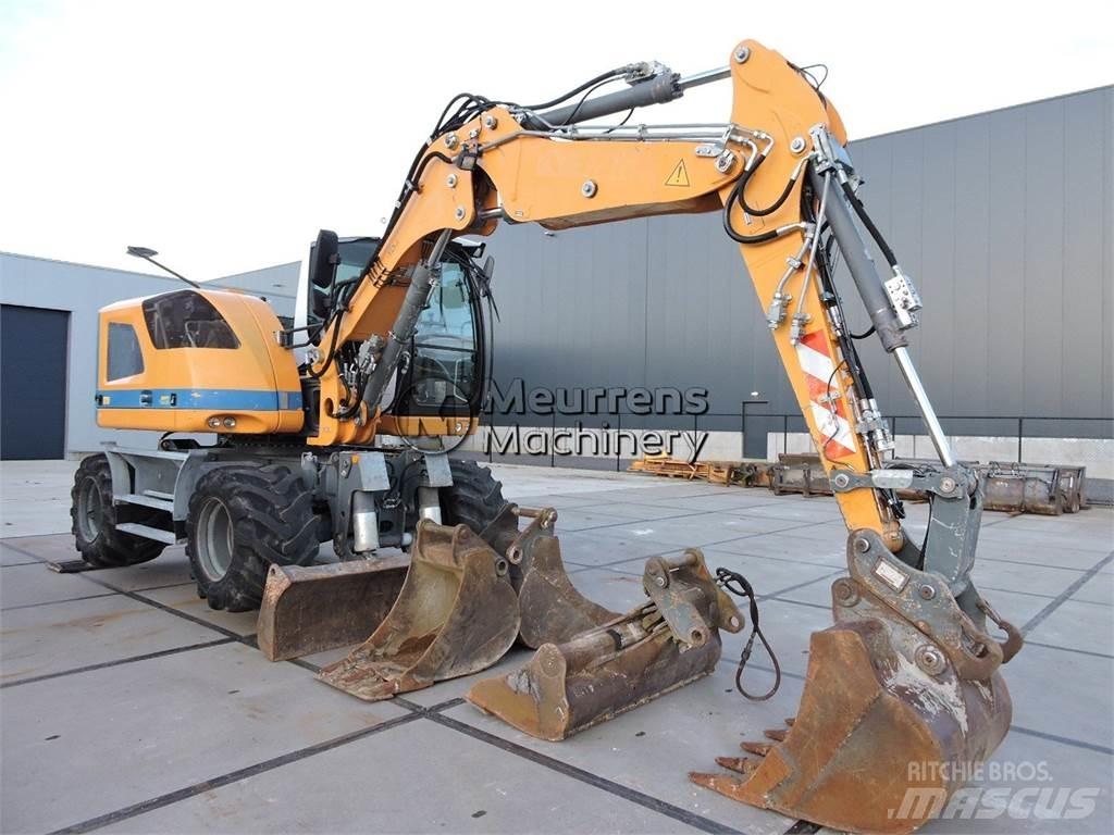 Liebherr A910 Kolová rýpadla