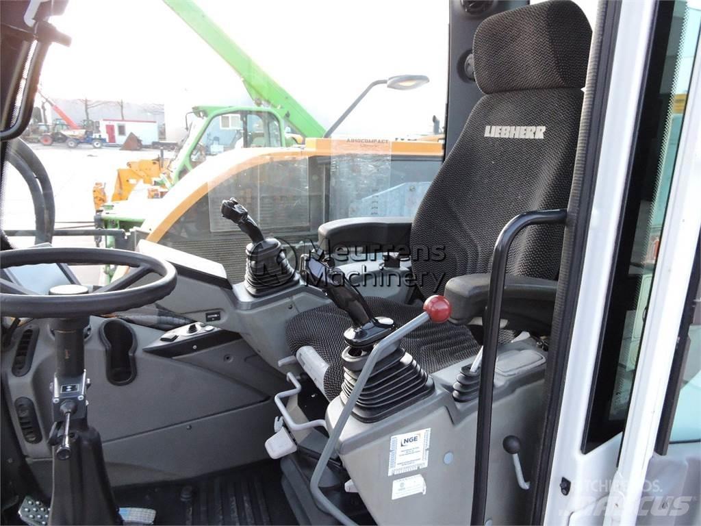 Liebherr A910 Kolová rýpadla