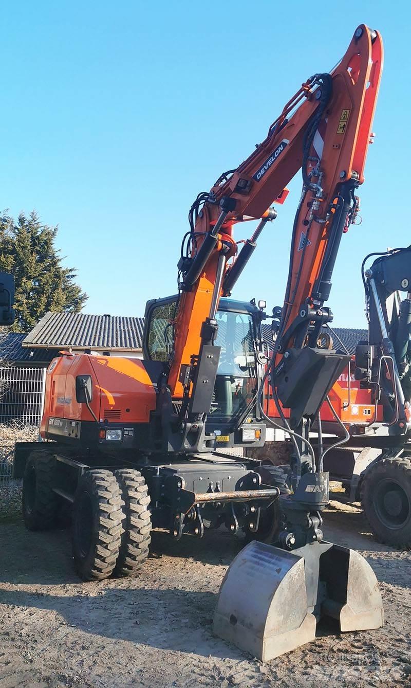 Develon DX 100 W-7 Kolová rýpadla
