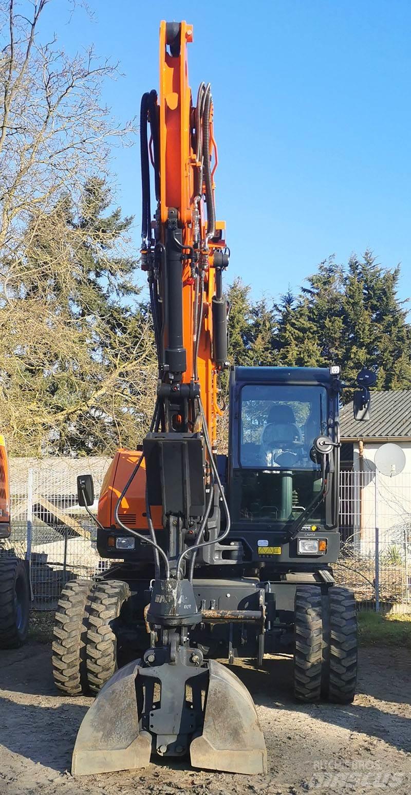 Develon DX 100 W-7 Kolová rýpadla