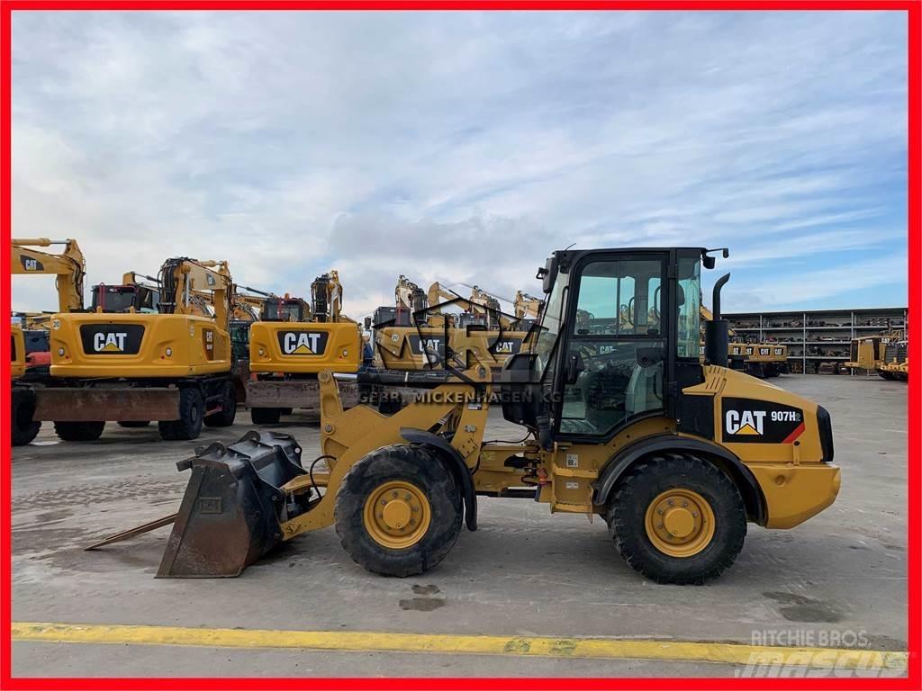 CAT 907H2 Kolové nakladače
