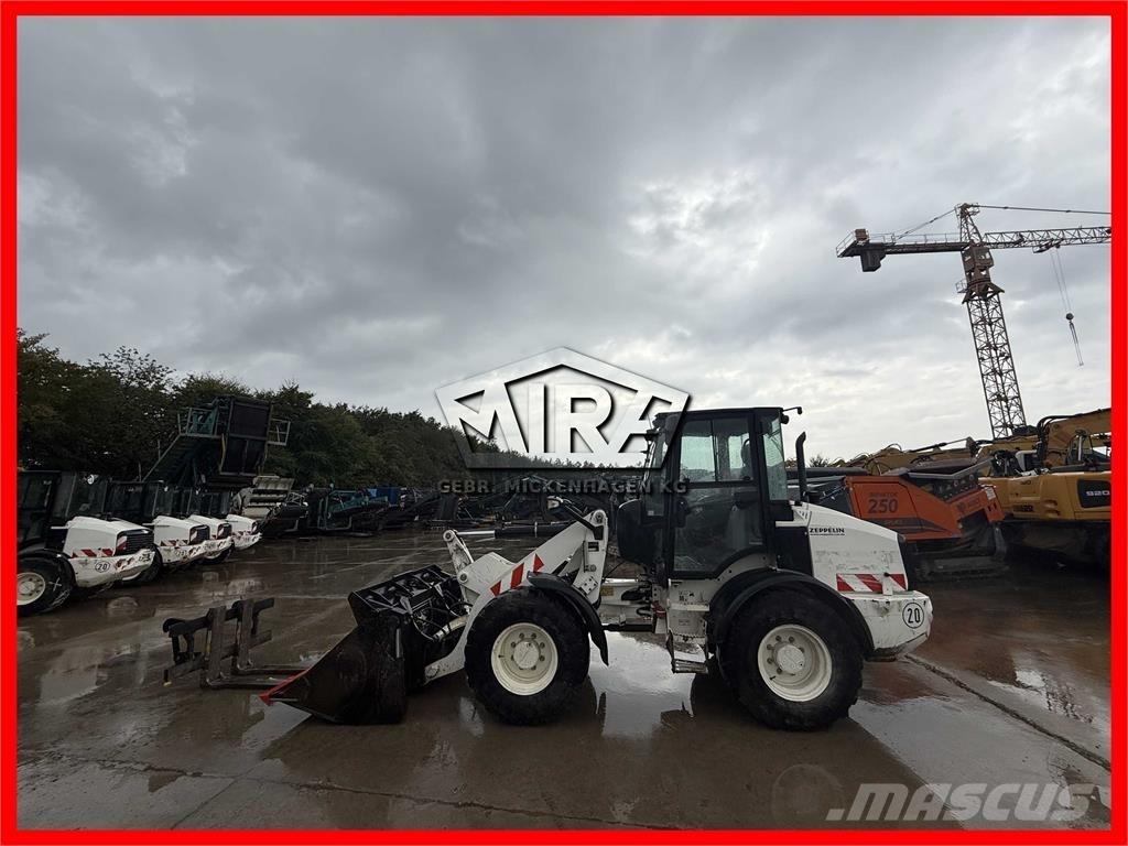CAT 908M Kolové nakladače