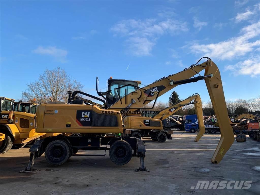CAT MH3022 Stroje pro manipulaci s odpadem