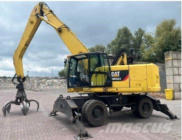 CAT 3022 Kolová rýpadla