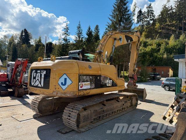 CAT 323D Pásová rýpadla