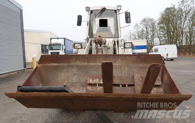 CAT 910 E Kolové nakladače