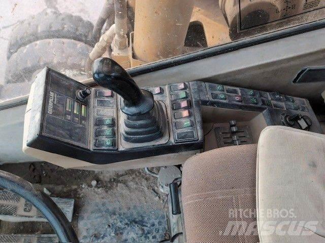 CAT M320 Kolová rýpadla