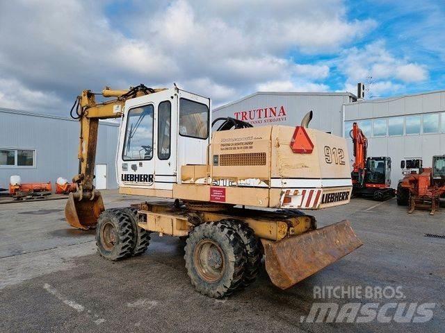 Liebherr A912 Kolová rýpadla