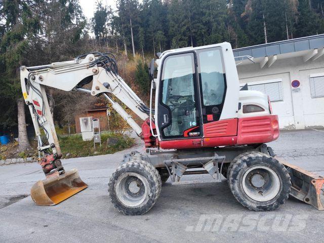 Takeuchi TB295W Kolová rýpadla