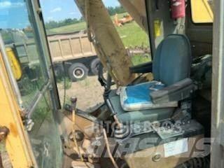 CAT 245 Pásová rýpadla