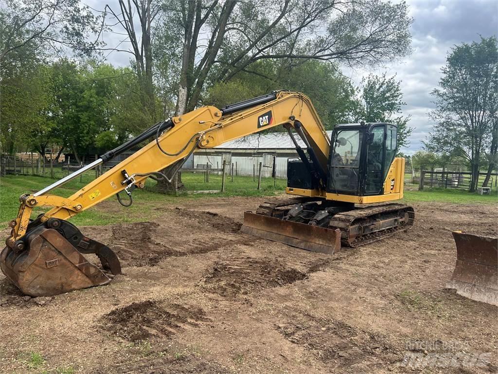 CAT 310 Pásová rýpadla