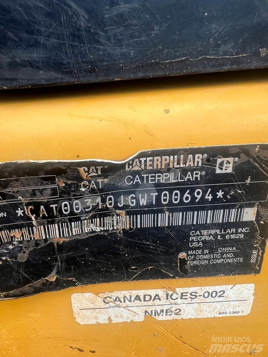 CAT 310 Pásová rýpadla