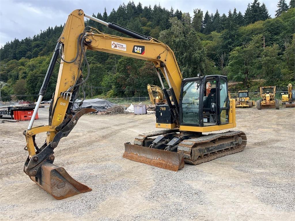 CAT 310 Pásová rýpadla
