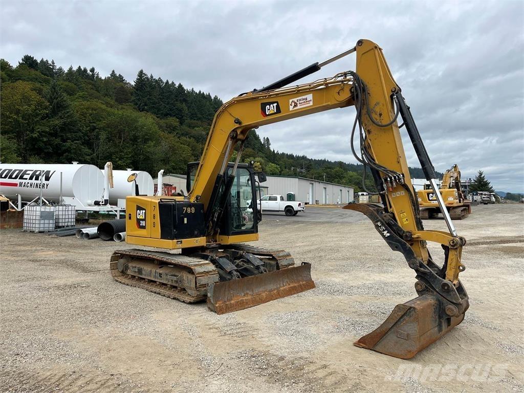 CAT 310 Pásová rýpadla