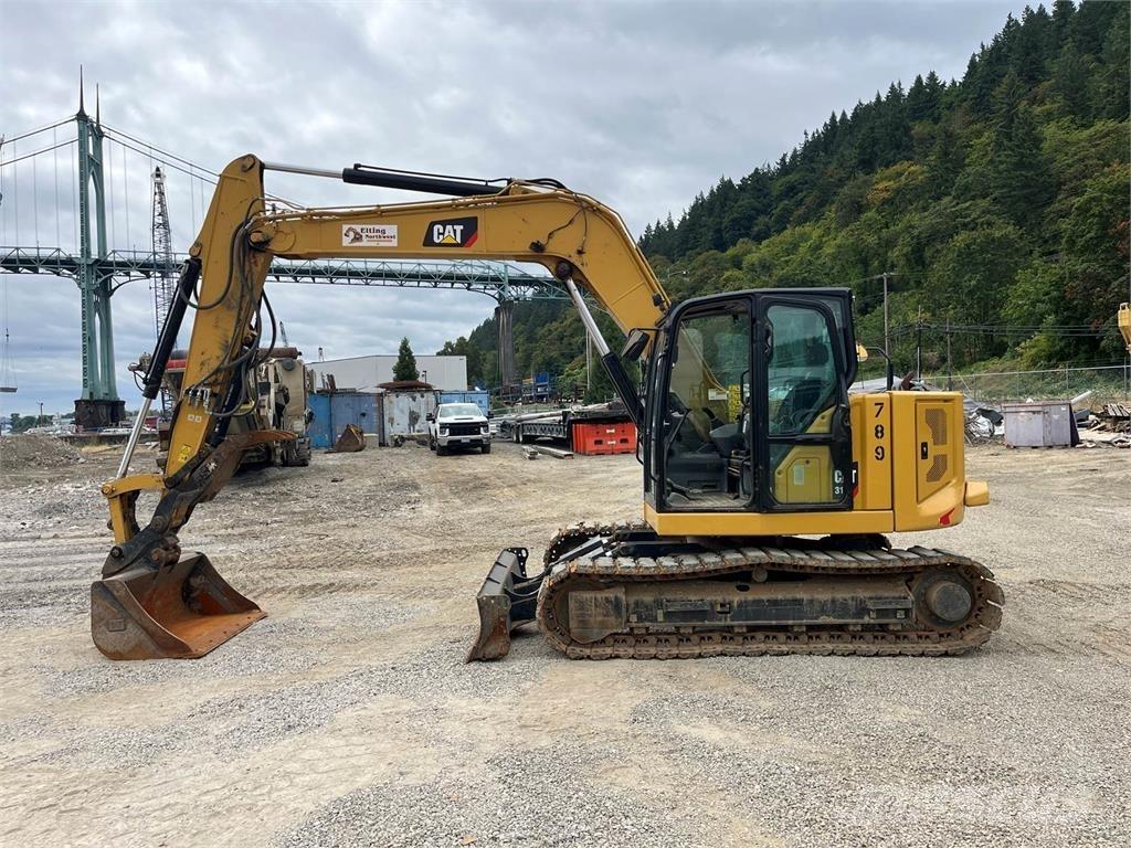 CAT 310 Pásová rýpadla