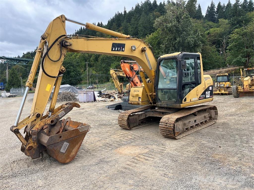 CAT 311C Pásová rýpadla