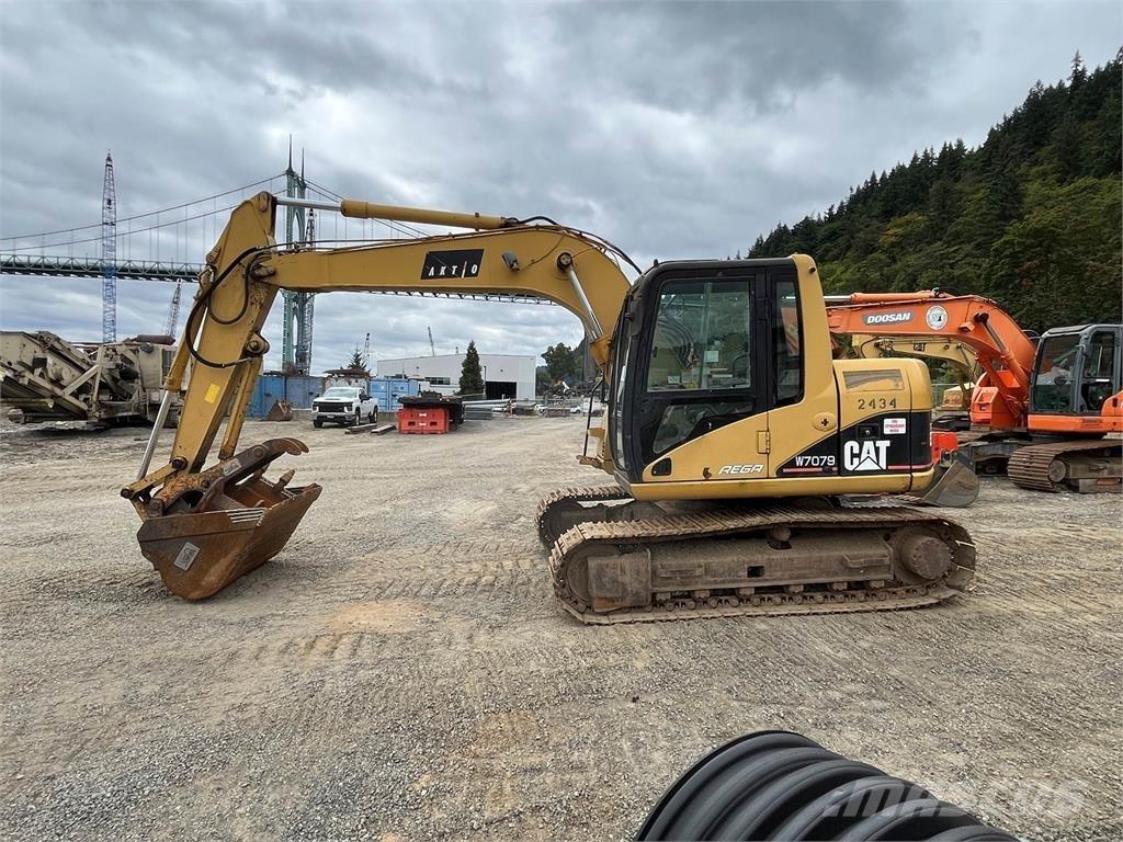 CAT 311C Pásová rýpadla