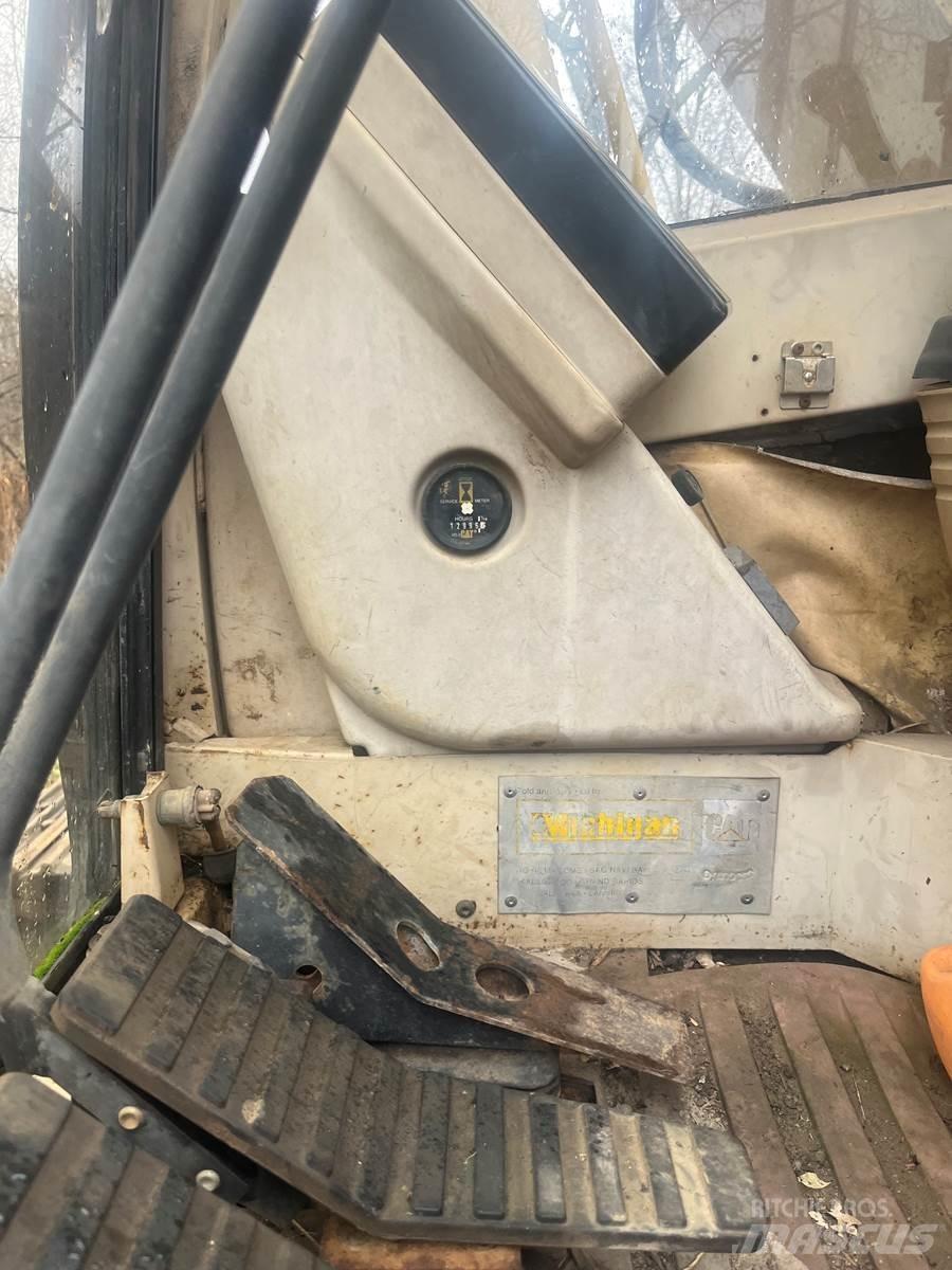 CAT 315 Pásová rýpadla