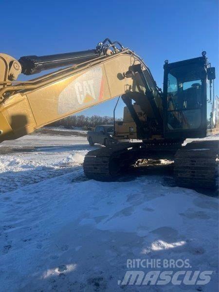 CAT 323FL Pásová rýpadla