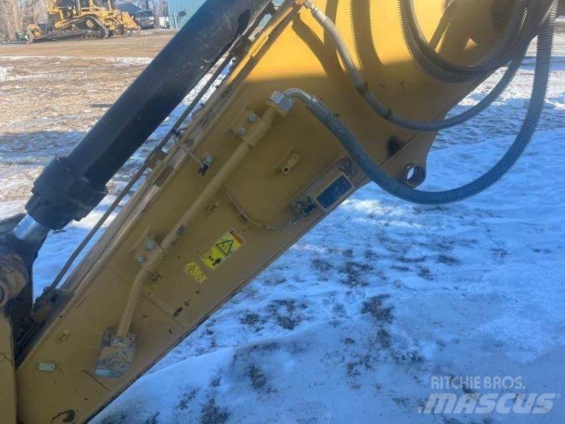 CAT 323FL Pásová rýpadla