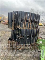 CAT 325 Pásy, řetězy a podvozek