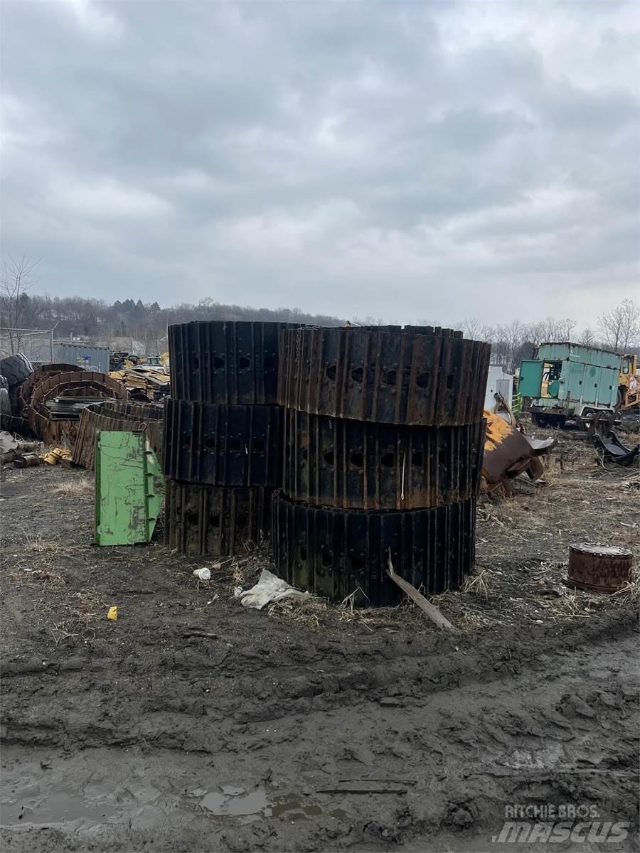 CAT 325 Pásy, řetězy a podvozek