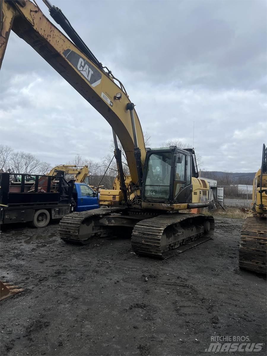 CAT 329DL Pásová rýpadla